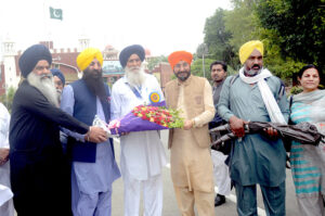 Guru Arjan Dev Jealous Sikhs arrives in Pakistan across the Wagah border from India under the leadership of Sardar Gurbachan Singh to participate in the Yatri celebrations.
