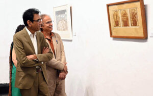 Federal Minister for education and professional training Dr Khalid Maqbool Siddiqui viewing painting exhibition at NCA.