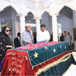 President Asif Ali Zardari showering petals over the grave of Shaheed Mohtarma Benazir Bhutto on her 71st birth anniversary, in Garhi Khuda Baksh Bhutto