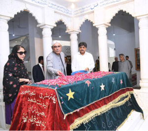 President Asif Ali Zardari showering petals over the grave of Shaheed Mohtarma Benazir Bhutto on her 71st birth anniversary, in Garhi Khuda Baksh Bhutto