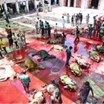 Butchers busy in slaughtering sacrificial animals at Jamia Naeemia on the first day of Eidul Azha