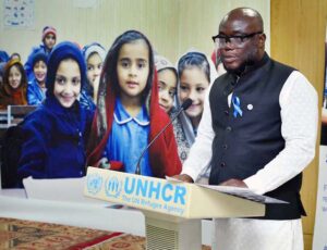 Head of UNHCR Sub-office Peshawar Mr. Kofi Ohenenana Dwomo addressing during the ceremony on the World refugee Day.