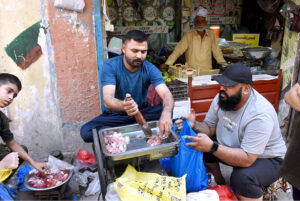 Vendor preparing Mincemeat of the sacrificial animal on the second day of Eidul Adha festive