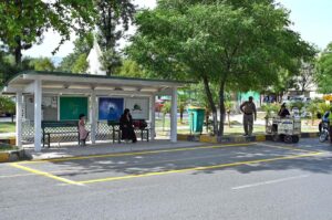 CDA painting crew draw lines for Electric Buses stop in Federal Capital.