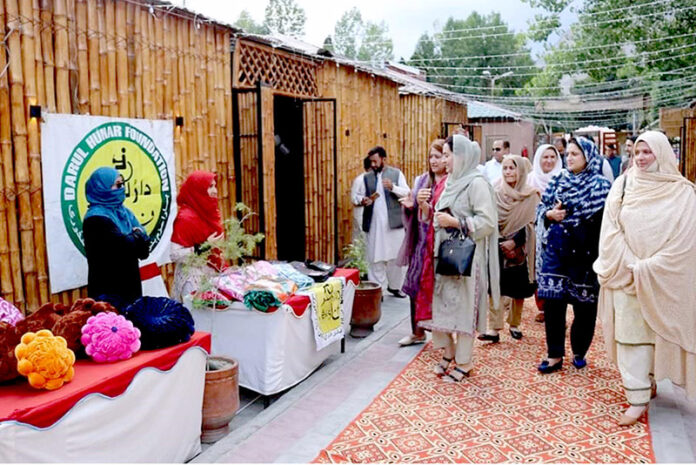 Deputy Speaker Gilgit-Baltistan Assembly Sadia Danish visiting the stall during the Summer Fest 2024 organized by the Women Chamber of Commerce & Industry