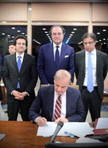 Prime Minister Muhammad Shehbaz Sharif signs the documents of the Federal Budget 2024-25 after its approval from the Federal Cabinet to be laid before the National Assembly.