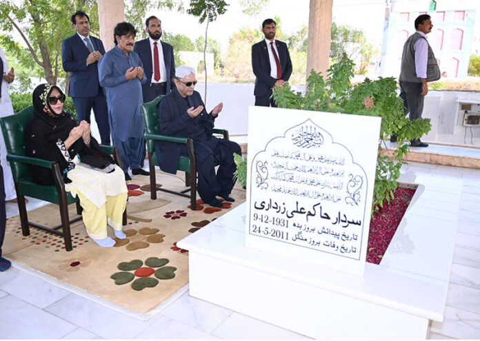 President Asif Ali Zardari offering Fateha over the grave of his late father, Sardar Hakim Ali Zardari