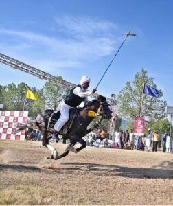Former Deputy Mayor, Syed Zeeshan Ali Naqvi presenting souvenir to U.S Deputy Chief of Mission Andrew J Schofer during 12th Tent Pegging Championship 2024 at Fatima Jinnah Park, F-9.
