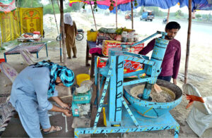 Quenching summer's thirst, one sip at a time: A roadside vendor is selling a perfect blend of tradition and refreshment 'Sardai" in the city.