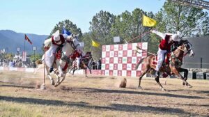 Former Deputy Mayor, Syed Zeeshan Ali Naqvi presenting souvenir to U.S Deputy Chief of Mission Andrew J Schofer during 12th Tent Pegging Championship 2024 at Fatima Jinnah Park, F-9.