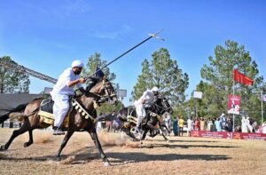Former Deputy Mayor, Syed Zeeshan Ali Naqvi presenting souvenir to U.S Deputy Chief of Mission Andrew J Schofer during 12th Tent Pegging Championship 2024 at Fatima Jinnah Park, F-9.