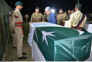 Federal Minister for Interior and Anti-Narcotics Mohsin Naqvi paying homage to ANF martyrs.