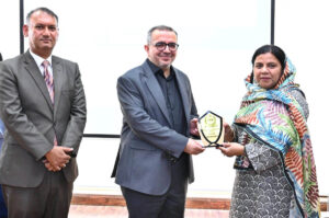 Chairman Punjab Revenue Authority, Dr Javed Iqbal is presented souvenir to Chief Instructor Ms. Samina Intizar and Director Fouz Khalid Khan on the occasion officers of the 40th mid-career management course of National Institute of Management at Punjab Revenue Authority.