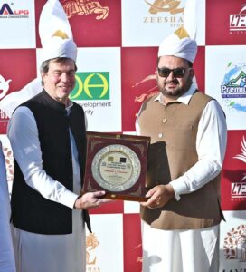 Former Deputy Mayor, Syed Zeeshan Ali Naqvi presenting souvenir to U.S Deputy Chief of Mission Andrew J Schofer during 12th Tent Pegging Championship 2024 at Fatima Jinnah Park, F-9.