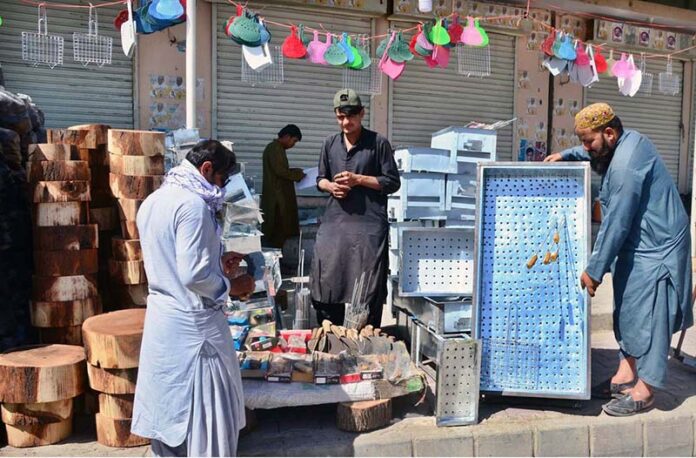 Vendor selling barbeque items at Sariab Road ahead of Eid-ul Azah