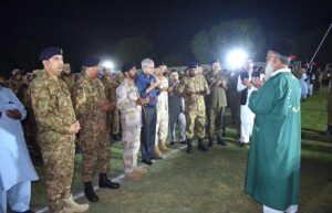 Federal Minister for Interior and Anti-Narcotics Mohsin Naqvi paying homage to ANF martyrs.