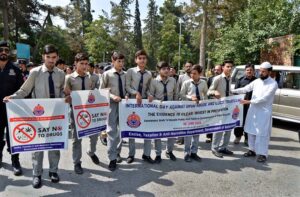 Students participating in a rally organised by Excise and Taxation and Anti-Corruption departments on the occasion of International Day Against Drug Abuse and Illicit Trafficking.