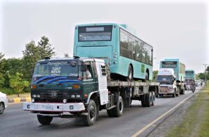 Electric Buses parked at Convention Centre. A fleet of 8 electric buses arrives in the federal capital, bringing the total to 30 out of 160 buses. 22 buses arrived in the city with a charging point established at Jinnah Convention Center. Initially, these 30 buses will operate on two routes. The first route will commence from NUST Orange Line Depot in G-11, extending to PIMS Hospital. It will pass through G-11 Markaz, G-10 Markaz, G-9 Markaz, and G-8 Markaz before concluding at PIMS. This route includes 13 stops, with buses arriving at each stop every ten minutes.