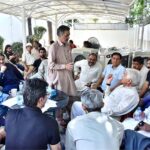 Defense Minister Khawaja Muhammad Asif listening problems of people at his residence