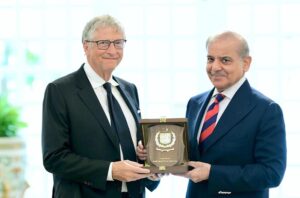 Prime Minister Muhammad Shehbaz Sharif presents a souvenir to Chairman Gates Foundation Bill Gates.