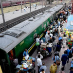 People arriving at railway station, departing to their hometowns to spend Eid ul Azha holidays with their loved ones