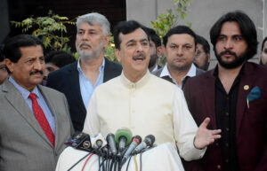 Chairman Senate Syed Yousuf Raza Gilani talking to media persons after performing groundbreaking of construction of residential 8-Towers at Askari 2.