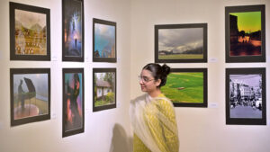 A female art enthusiast stands captivated by a painting at the Annual Members Photographic Competition & Exhibition. In collaboration with the Islamabad Club and Islamabad Camera Club, PNCA in Federal Capital