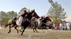 Tent Peggers aiming their targets during the 12 Tent Pegging Competition organized by CDA at F-9 Park.