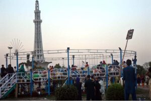 A large number of people visiting Greater Iqbal Park to spend their holiday in Provincial Capital.