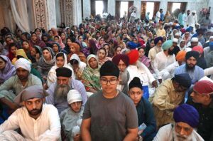 Sikh pilgrims performing religious rituals at Gurdwara as Sikh pilgrims from India and other countries arrived in Pakistan to take part in religious rituals for the fifth Sikh Guru Arjan Dev Ji’s 418th death anniversary