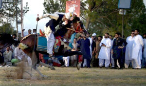 Tent Peggers aiming their targets during the 12 Tent Pegging Competition organized by CDA at F-9 Park.