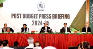 Finance Minister Senator Muhammad Aurangzeb addressing media persons at the Post Budget 2024-25 Press Conference along with Minister of State for Finance & Revenue Ali Pervaiz Malik.
