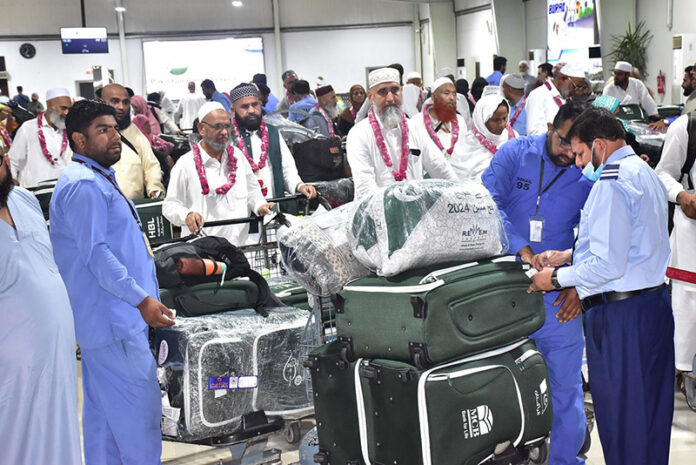 Director Hajj Operation Punjab Muhammad Rizwan Sharif and other officials accorded warm rosy welcome to the Hajj pilgrims upon their arrival