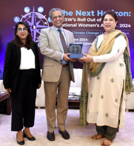 NCSW Chairman Ms. Nilofer Bakhtiar Presenting Shield to Honorable Minister for Law and Justice and Human Rights Senator Azam Nazeer Tarar.