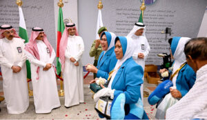 Saudi officials welcome the Hajj pilgrims from different countries on their arrival