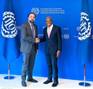Federal Minister for Overseas Pakistanis and Human Resource Development, Chaudhry Salik Hussain shaking hand with the Director General of International Labour Organisation Gilbert Houngbo during 112th International Labour Conference.