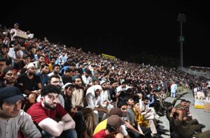 A large number of spectators watching T-20 cricket match between Pakistan and India during ICC Men's T20 World Cup on big screens installed by Pakistan Cricket Board (PCB) at Rawalpindi Cricket Stadium.
