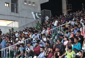 A large number of spectators watching T-20 cricket match between Pakistan and India during ICC Men's T20 World Cup on big screens installed by Pakistan Cricket Board (PCB) at Rawalpindi Cricket Stadium.