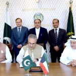 Secretary of the Ministry of Economic Affairs, Dr. Kazim Niaz and Lt. Gen. (Retd.) Sajjad Ghani, Chairman of WAPDA, signs the Subsidiary Loan Agreement (SLA) amounting to US$ 25 million for the Mohmand Dam Hydropower Project. The Ambassador of Kuwait in Pakistan, Nassar Abdulrahman Jasser Al. Mutairi witnessing the signing ceremony