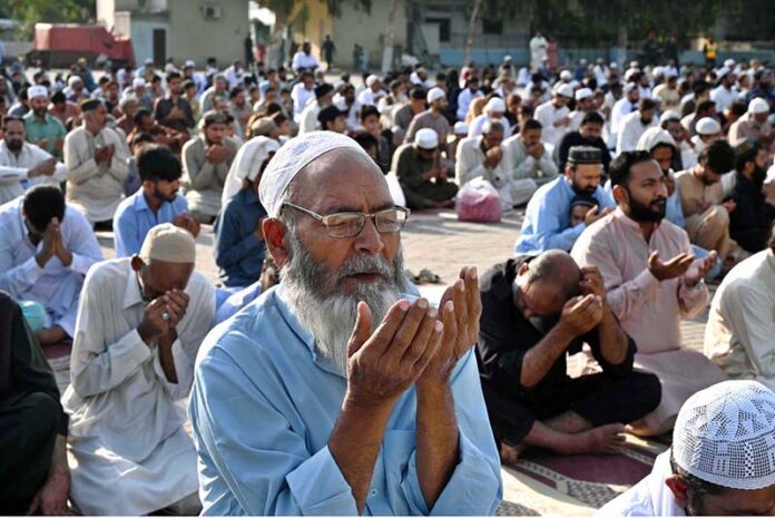 A large number of faithful offering Eidul Azha prayers at Eidgah Sharif