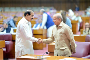 Prime Minister Muhammad Shehbaz Sharif interacts with the members of National Assembly during a session of the National Assembly.