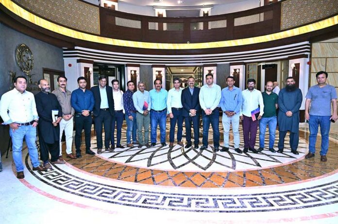 National Project Coordinator, Dr. Faisal Iqbal in a group photo with participants during the training workshop on 