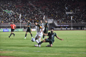 FIFA World Cup 2026 Asian qualifier match between Pakistan and Saudi Arabian football teams playing at the Jinnah Football Stadium.