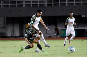 FIFA World Cup 2026 Asian qualifier match between Pakistan and Saudi Arabian football teams playing at the Jinnah Football Stadium.