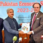 Dr. Imtiaz Ahmad, Economic Adviser, Finance Division presenting copy of Pakistan Economic Survey to Finance Minister Senator Muhammad Aurangzeb at Launch Ceremony of Pakistan Economic Survey 2023-24