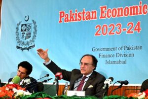 Dr. Imtiaz Ahmad, Economic Adviser, Finance Division presenting copy of Pakistan Economic Survey to Finance Minister Senator Muhammad Aurangzeb at Launch Ceremony of Pakistan Economic Survey 2023-24