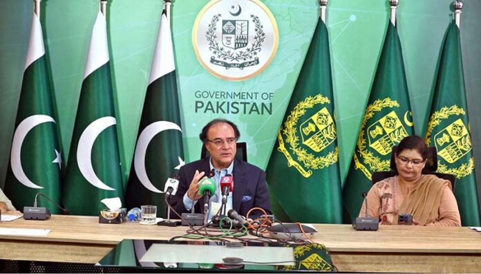 Federal Minister for Finance and Revenue Senator Muhammad Aurangzeb addressing media persons at PTV Headquarters