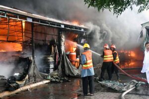 A view of smoke emitting after horrific fire erupts in weekly bazaar in H-9 sector. According to CDA as many as 300 stalls burnt to ashes in the incident. Luckily no causalities reported in the incident