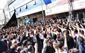Mourners oozing themselves with knives and chain during the procession on 08th Muharram-ul-Harram at main Bazaar.