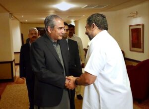 Federal Minister for Interior and Narcotics Control Mohsin Naqvi shaking hands with Sri Lankan High Commissioner Admiral (R) Ravindra Chandrasiri Wijegunaratne.